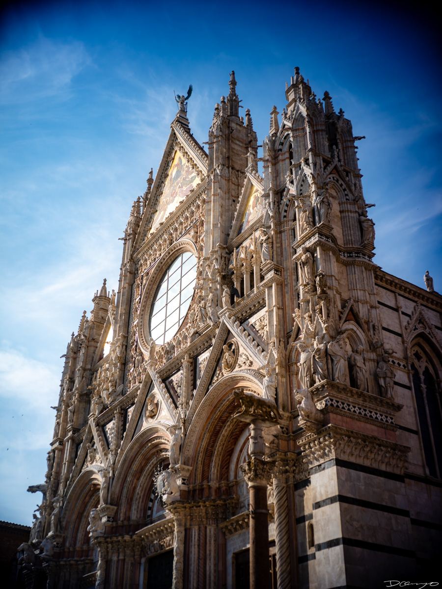 Photos from a trip through Italy in Summer of 2023. Locations include Rome, Florence, Tuscany, Castello di Bossi in Chianti, Siena, San Gimignano, Sirmione on Lake Garda, Bologna, Gudon, Italian Dolomites, Seceda, Cadini di Misurina, and Venice.